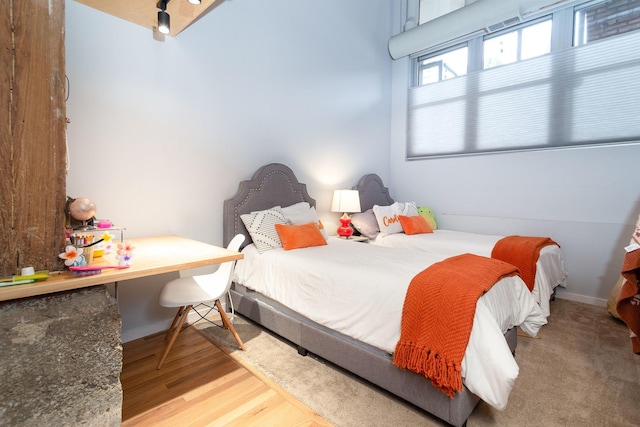 bedroom featuring light hardwood / wood-style floors