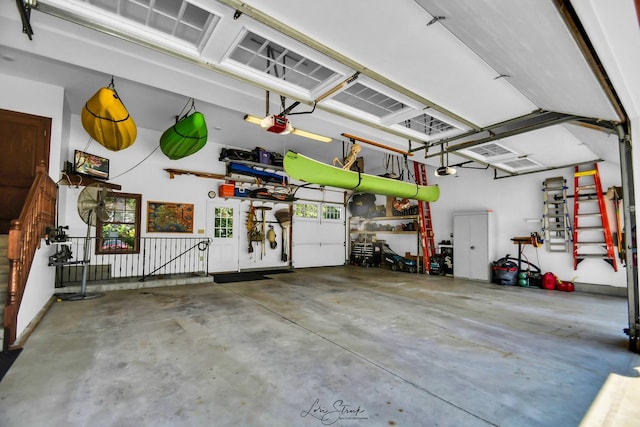 garage featuring a garage door opener