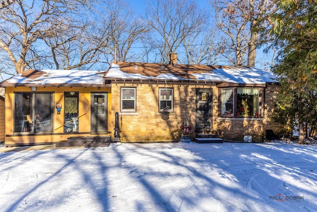 view of snow covered property