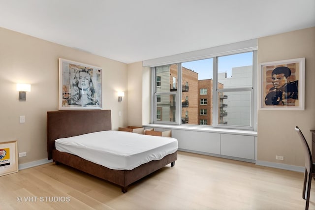 bedroom featuring light hardwood / wood-style flooring