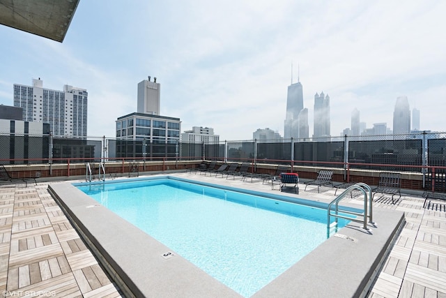 view of swimming pool with a patio area