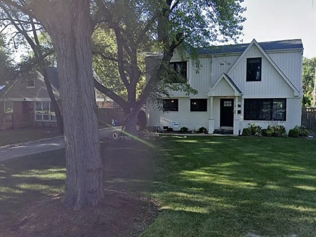 modern farmhouse style home with a front yard