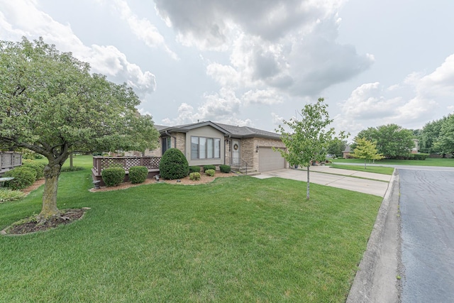 view of front of house with a front yard and a garage