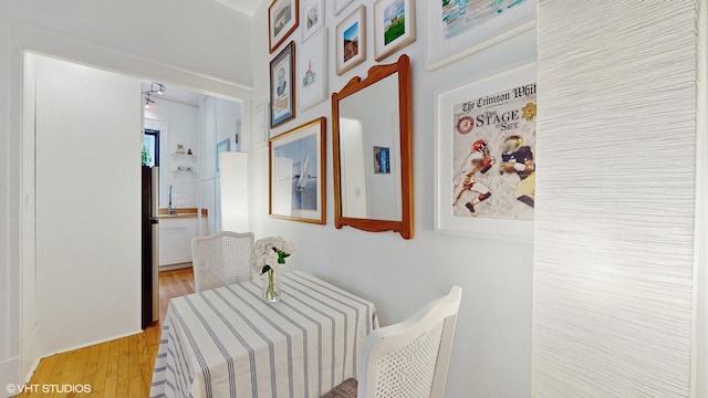 interior space with sink and light hardwood / wood-style floors