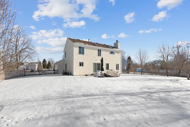 view of snow covered property