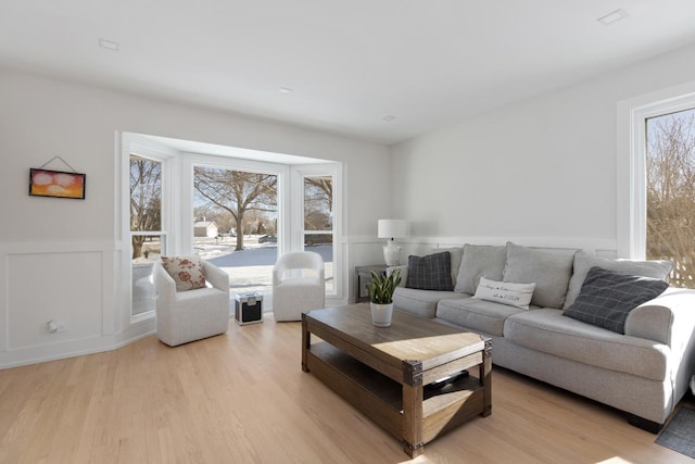 living room with light hardwood / wood-style floors