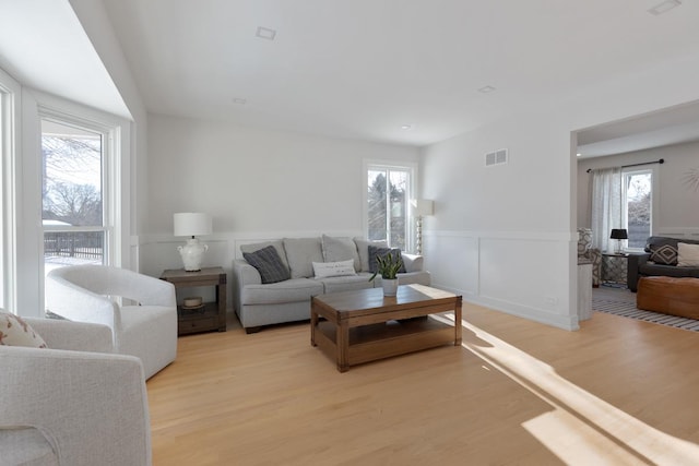 living room featuring light wood-type flooring