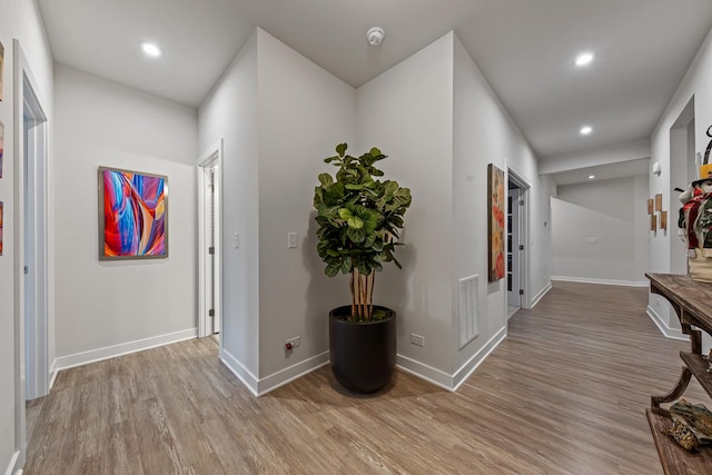 corridor featuring light wood-type flooring