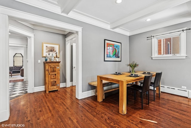 dining room featuring beam ceiling, baseboard heating, dark hardwood / wood-style flooring, and ornamental molding