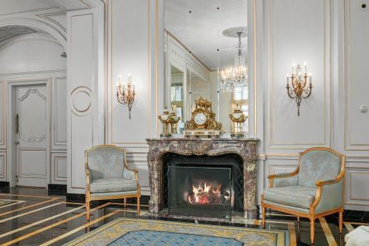 sitting room with a fireplace