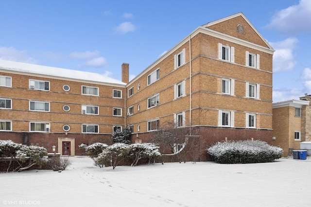 view of snow covered property