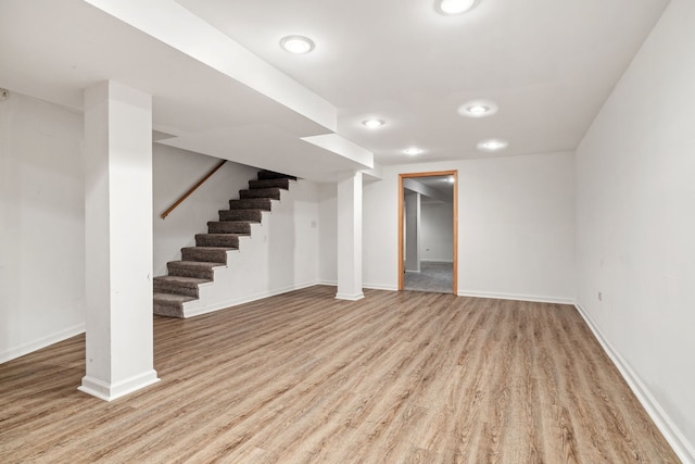 basement with light wood-type flooring