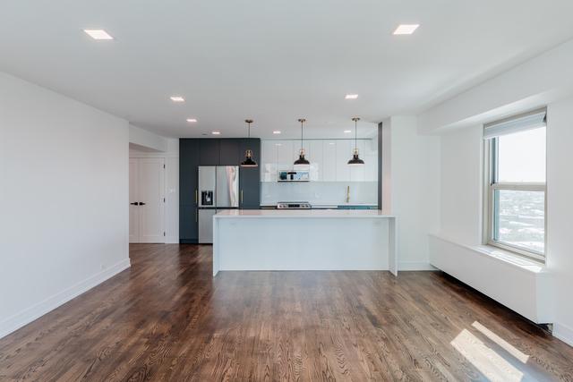 kitchen featuring decorative backsplash, stainless steel refrigerator with ice dispenser, hanging light fixtures, and dark wood-type flooring