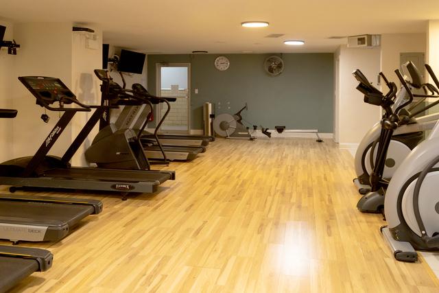 exercise area featuring light wood-type flooring