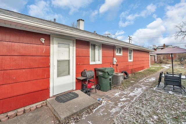 exterior space featuring central air condition unit