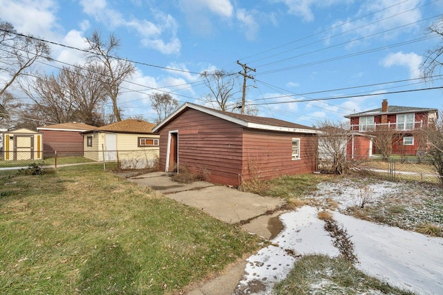 exterior space featuring a shed and a lawn