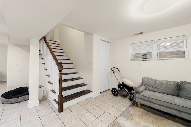 living room featuring light tile patterned floors