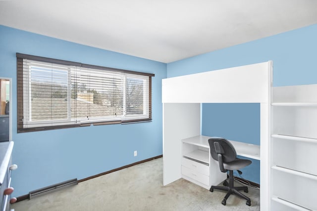 carpeted home office featuring baseboards and visible vents