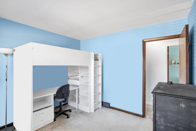 home office with carpet and baseboards