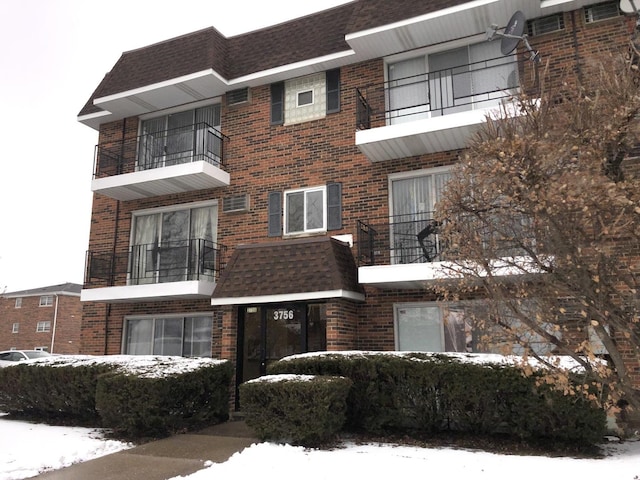 view of snow covered building