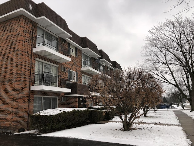 view of snow covered property