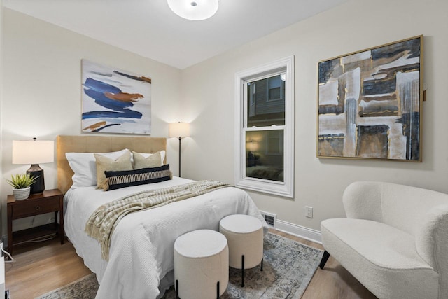 bedroom featuring wood-type flooring