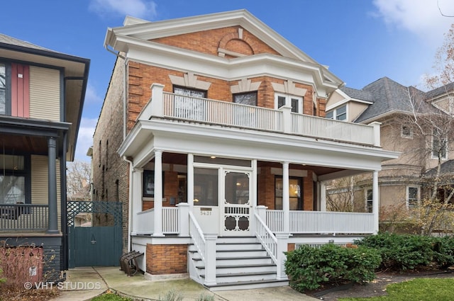 view of front of house featuring covered porch and a balcony