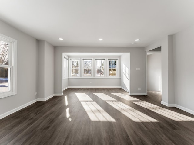 unfurnished room featuring dark hardwood / wood-style floors