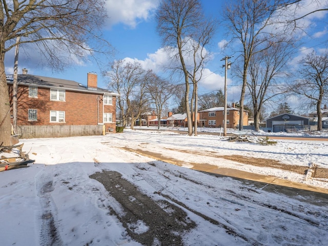 view of yard covered in snow