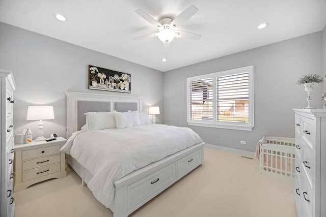 carpeted bedroom featuring ceiling fan