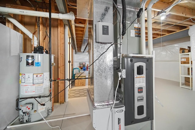 utilities featuring heating unit and gas water heater