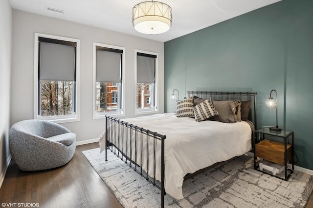 bedroom featuring hardwood / wood-style floors