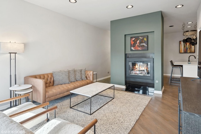 living room with light hardwood / wood-style floors