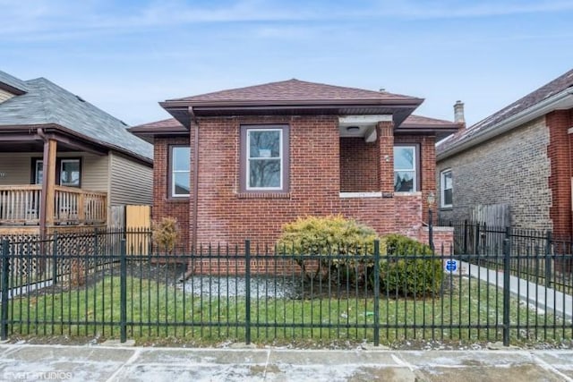 view of front of home with a front yard