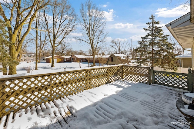 view of snow covered deck