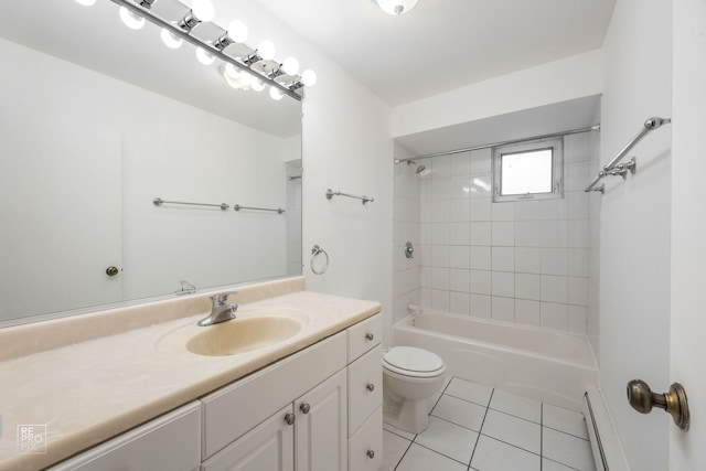 full bathroom with vanity, tile patterned flooring, tiled shower / bath combo, toilet, and baseboard heating