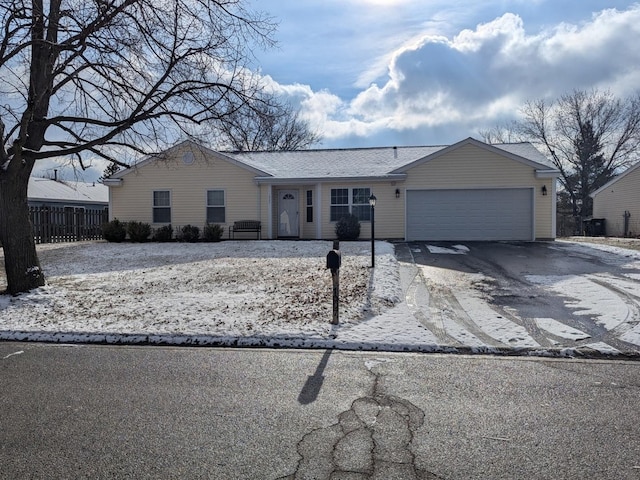 single story home with a garage