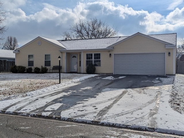 single story home with a garage