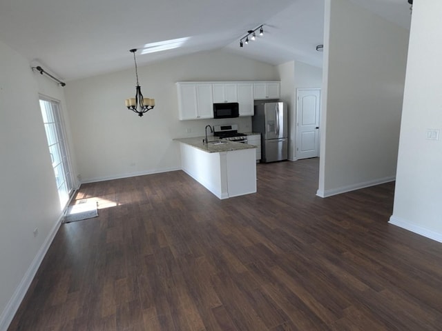 kitchen featuring white cabinetry, sink, stainless steel appliances, kitchen peninsula, and pendant lighting