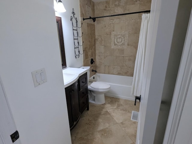 full bathroom featuring vanity, shower / tub combo, and toilet