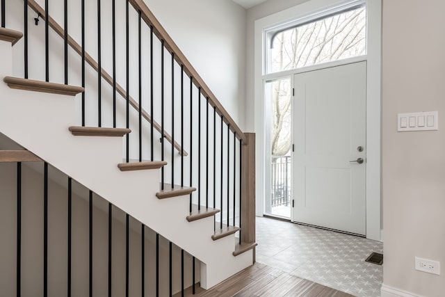 entryway with light hardwood / wood-style floors