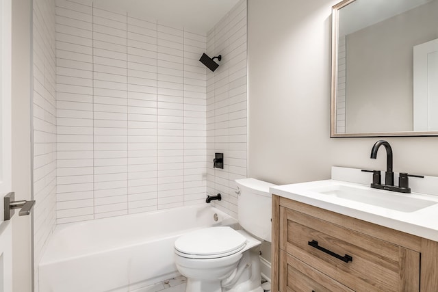 full bathroom featuring tiled shower / bath combo, toilet, and vanity