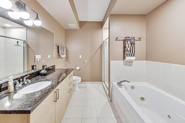 full bathroom featuring separate shower and tub, vanity, tile patterned floors, and toilet