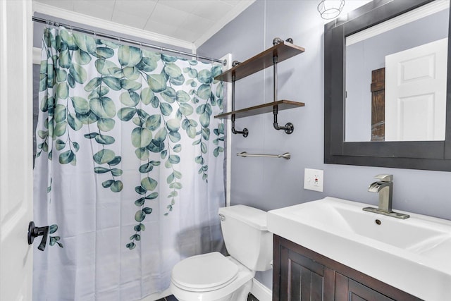 bathroom featuring a shower with shower curtain, vanity, toilet, and crown molding