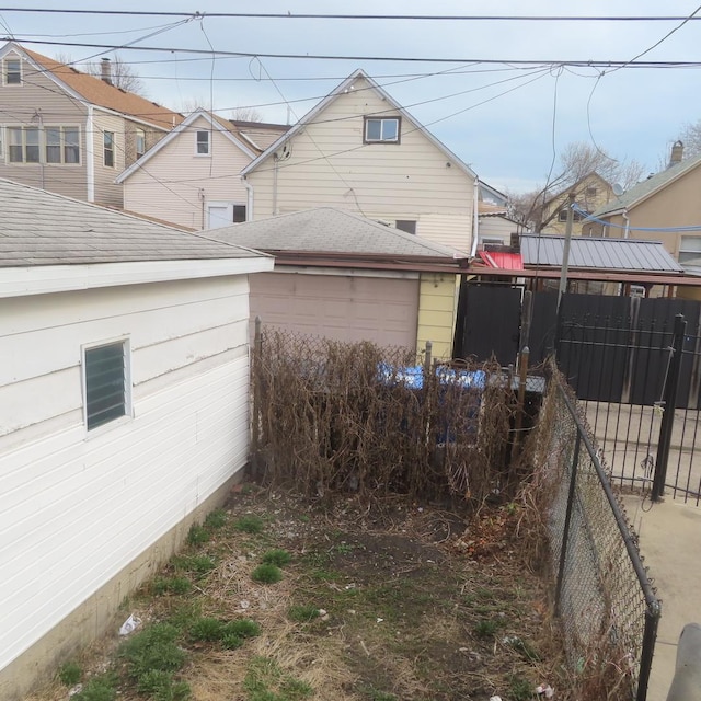 2933 S Arch St, Chicago, IL 60608 - view of yard with a garage and fence