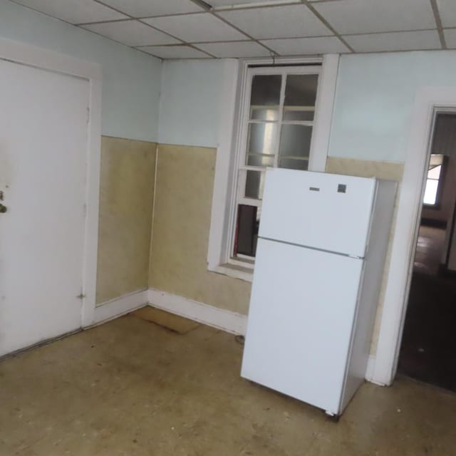 kitchen featuring white fridge