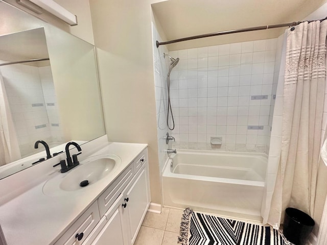 bathroom with shower / tub combo, tile patterned floors, and vanity