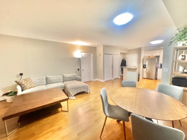 dining area featuring light hardwood / wood-style flooring