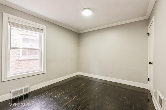 empty room with dark hardwood / wood-style floors