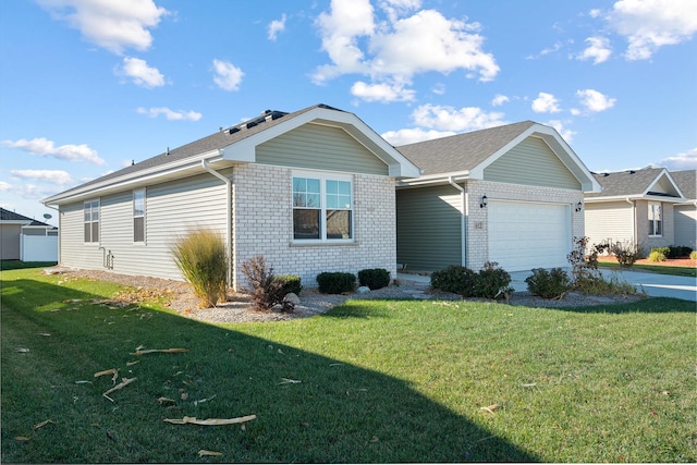 ranch-style home with a garage and a front lawn